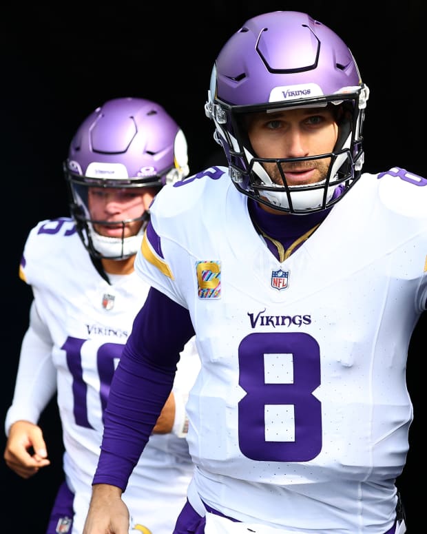 Oct 15, 2023; Chicago, Illinois, USA; Minnesota Vikings quarterback Kirk Cousins (8) takes the field before the game against the Chicago Bears at Soldier Field.